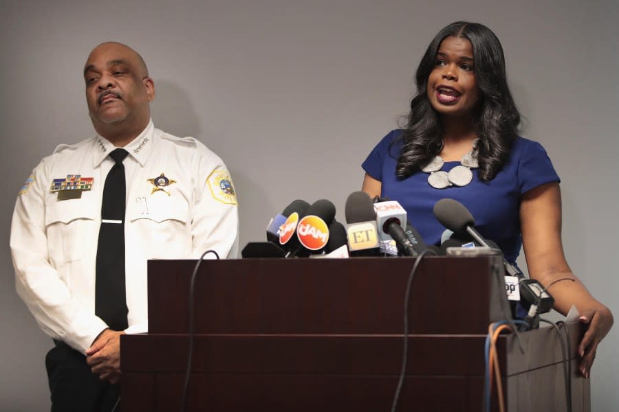 CHICAGO, ILLINOIS – FEBRUARY 22: Joined by Chicago Police Superintendent Eddie Johnson, Cook County State’s Attorney <span class="caas-xray-inline-tooltip"><span class="caas-xray-inline caas-xray-entity caas-xray-pill rapid-nonanchor-lt" data-entity-id="Kim_Foxx" data-ylk="cid:Kim_Foxx;pos:3;elmt:wiki;sec:pill-inline-entity;elm:pill-inline-text;itc:1;cat:OfficeHolder;" tabindex="0" aria-haspopup="dialog"><a href="https://search.yahoo.com/search?p=Kim%20Foxx" data-i13n="cid:Kim_Foxx;pos:3;elmt:wiki;sec:pill-inline-entity;elm:pill-inline-text;itc:1;cat:OfficeHolder;" tabindex="-1" data-ylk="slk:Kim Foxx;cid:Kim_Foxx;pos:3;elmt:wiki;sec:pill-inline-entity;elm:pill-inline-text;itc:1;cat:OfficeHolder;" class="link ">Kim Foxx</a></span></span> announces that charges have been filed against singer R. Kelly on February 22, 2019 in Chicago, Illinois. Kelly has been charged with 10 counts of aggravated sexual abuse of four victims, at least three between the ages of 13 and 17. (Photo by Scott Olson/Getty Images)