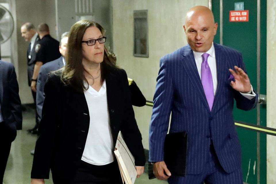 Manhattan Assistant District Attorney Joan Illuzzi-Orbon and attorney Arthur Aidala, one of Harvey Weinstein's lawyers, leave a hearing on July 11, 2019,  in New York.