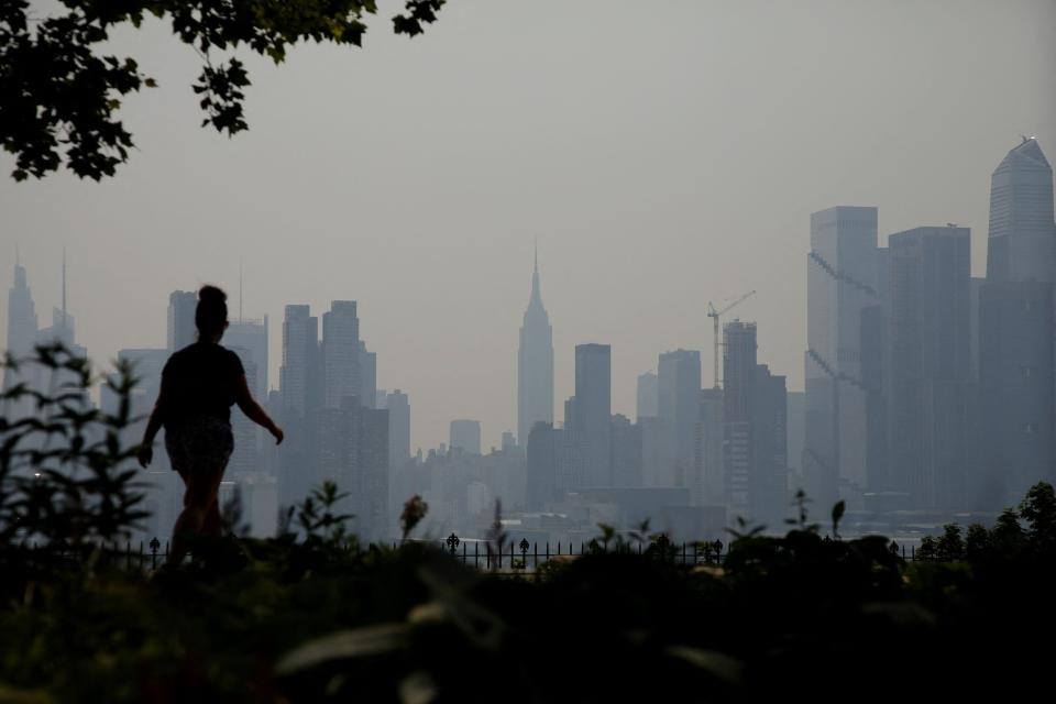 The Manhattan skyline is seen across the Hudson River in West New York, New Jersey, on June 8, 2023, as smoke haze from Canadian wildfires blankets the area.