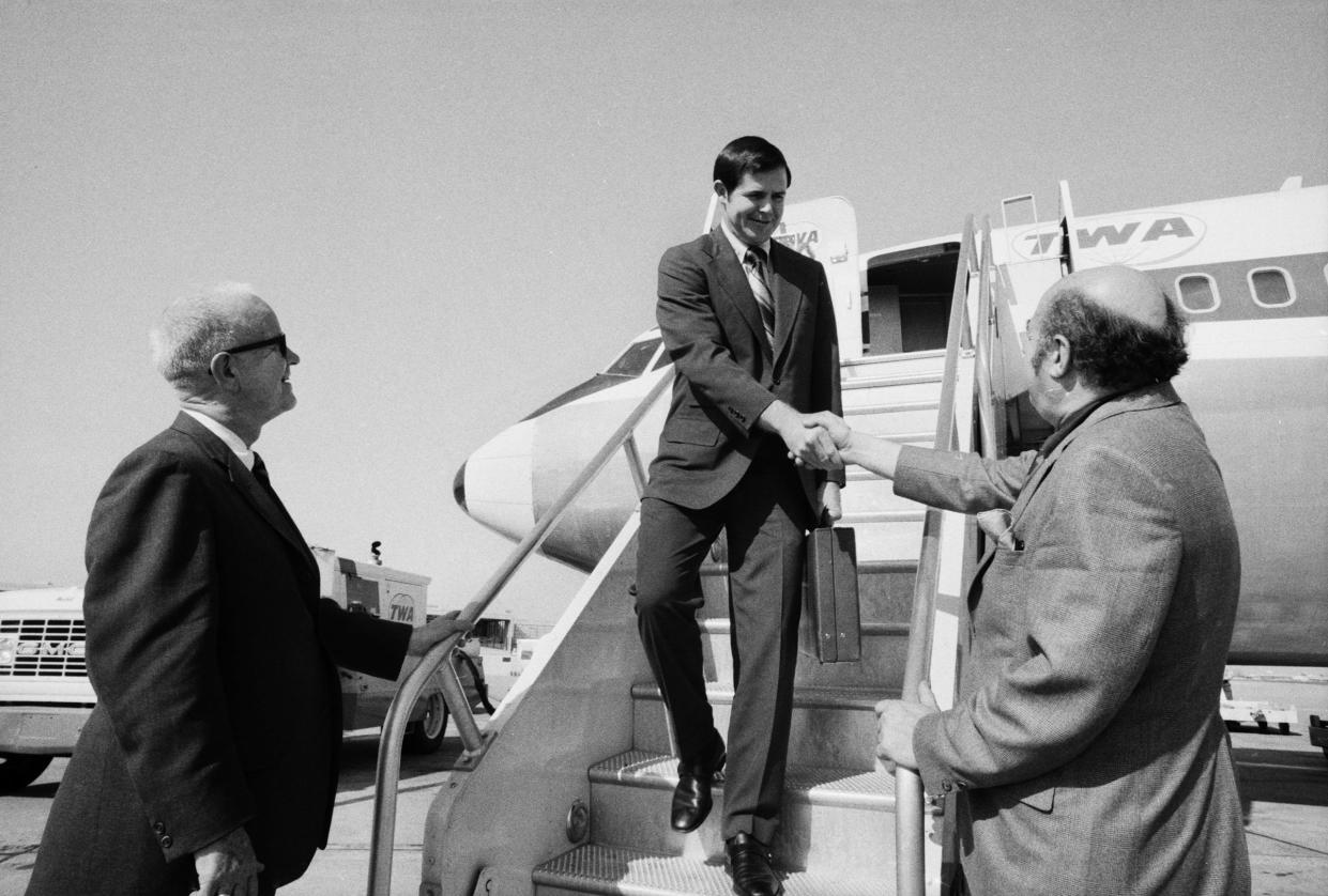 Denny Crum, the new University of Louisville head basketball coach, was greeted as he arrived in Louisville on April 19, 1971.