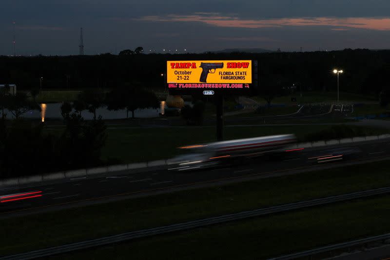 FILE PHOTO: A digital advertisement for the Tampa Gun Show sits along a highway in Tampa, Florida