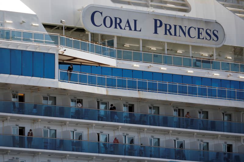 FILE PHOTO: Passengers are seen aboard the Coral Princess ship, of Princess Cruises fleet, with patients affected by coronavirus disease (COVID-19)