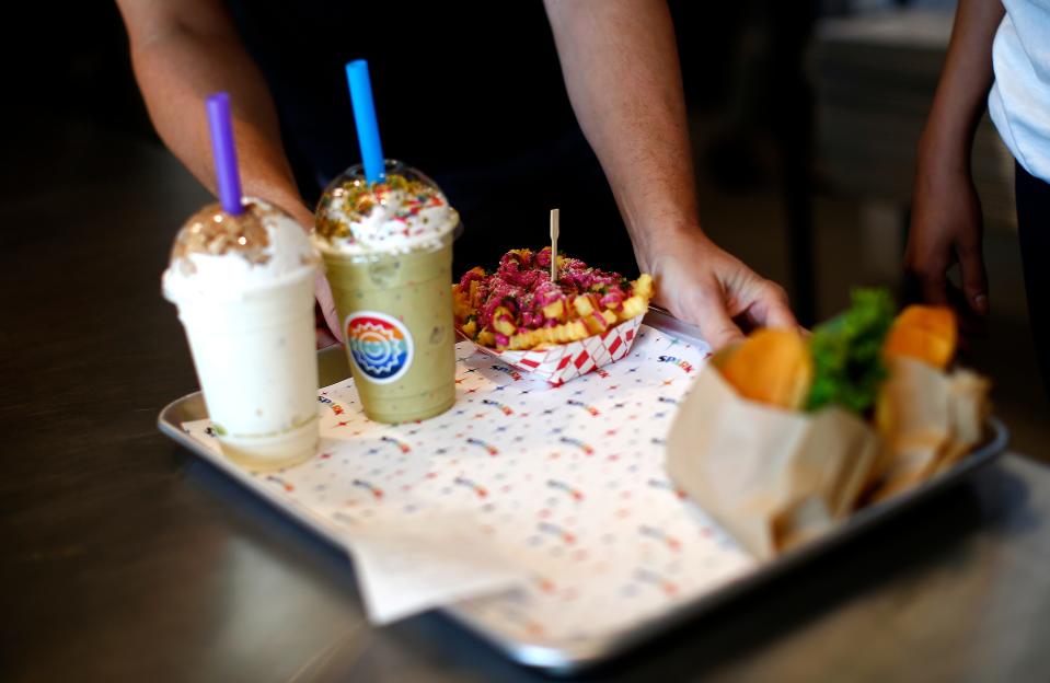 The food at Spark at Scissortail Park includes custard shakes, burgers, fries and more.