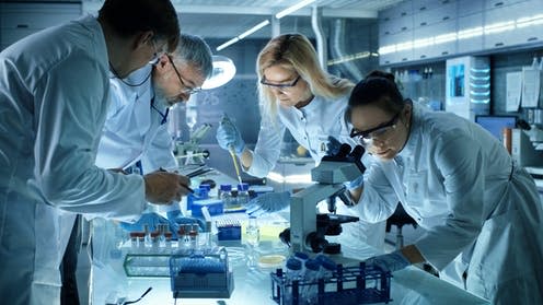 <span class="caption">Working together.</span> <span class="attribution"><a class="link " href="https://www.shutterstock.com/image-photo/team-medical-research-scientists-collectively-working-691541095" rel="nofollow noopener" target="_blank" data-ylk="slk:Shutterstock;elm:context_link;itc:0;sec:content-canvas">Shutterstock</a></span>