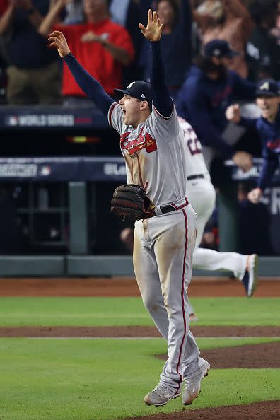 HOUSTON, TEXAS - NOVEMBER 02:  Austin Riley #27 of the Atlanta Braves celebrates with teammates after their 7-0 victory against the Houston Astros in Game Six to win the 2021 World Series at Minute Maid Park on November 02, 2021 in Houston, Texas. (Photo by Tom Pennington/Getty Images)