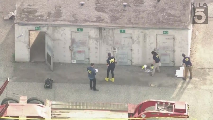 Robot seen outside a building after 16 people were injured in an explosion at an Irvine FBI training facility on March 13, 2024. (KTLA)