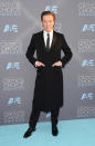 <p>We’re always happy to see the fellas mix up their suit game, so Damian Lewis’ extra-long suit jacket is one of our favorite looks from the guys this evening.</p>