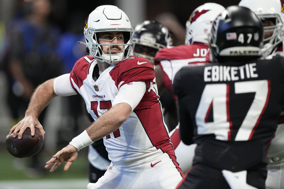 Arizona Cardinals quarterback David Blough (17) works in the pocket against the Atlanta Falcons during the first half of an NFL football game, Sunday, Jan. 1, 2023, in Atlanta. (AP Photo/John Bazemore)