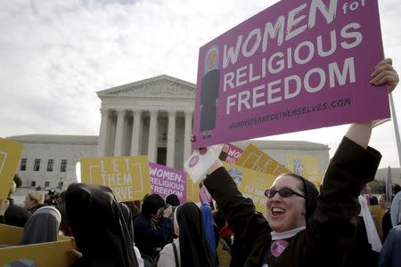 Nuns rally before Zubik v. Burwell, an appeal brought by Christian groups demanding full exemption from the requirement to provide insurance covering contraception under the Affordable Care Act, is heard by the U.S. Supreme Court in Washington, March 23, 2016. REUTERS/Joshua Roberts