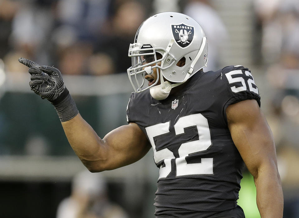 Khalil Mack (52) and Bruce Irvin didn't practice Wednesday due to 