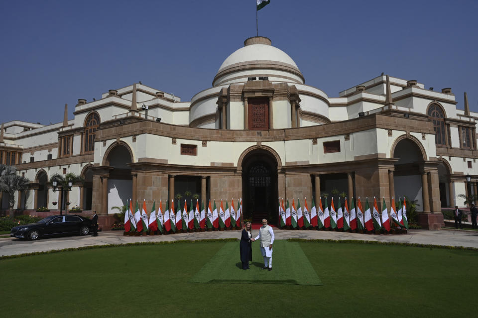 Italian Premier Giorgia Meloni, left, and Indian Prime Minister Narendra Modi, pose for the media before their meeting in New Delhi, India, Thursday, March 2, 2023. (AP Photo)