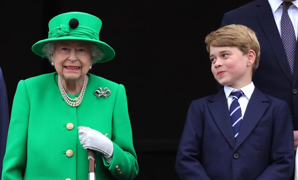 <p>The Queen and Prince George stand on the balcony of Buckingham Palace during the Platinum Jubilee Pageant in London. Prince George grins mischievously at his 'Gan Gan' – which is what he called his great-grandmother. </p>