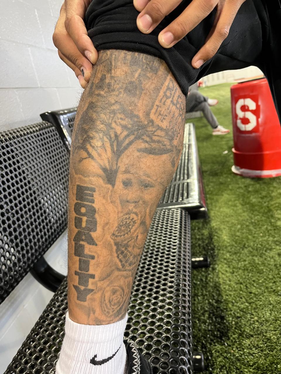 Gee Scott displays tattoo art meaningful to the Ohio State tight end.