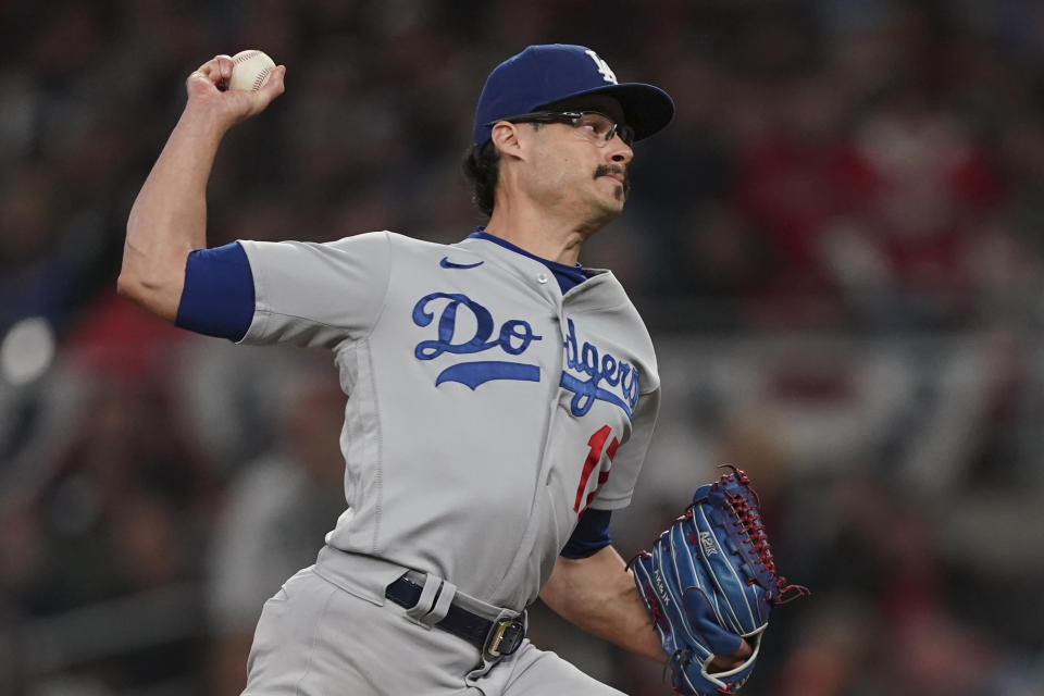 Los Angeles Dodgers pitcher Joe Kelly throws against the Atlanta Braves during the sixth inning in Game 2 of baseball's National League Championship Series Sunday, Oct. 17, 2021, in Atlanta. (AP Photo/Brynn Anderson)