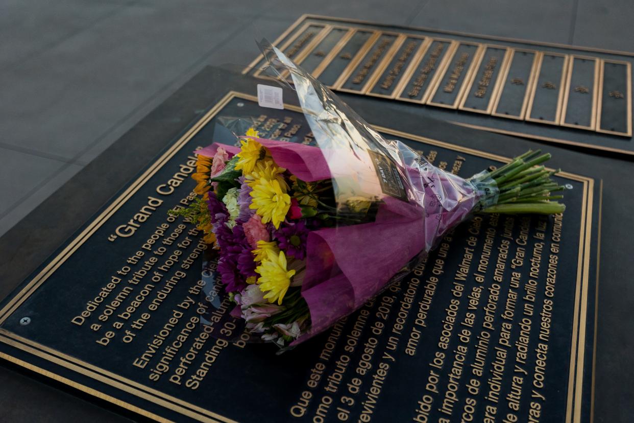 Flowers are left by the Grand Candela Memorial at the Walmart in El Paso after Patrick Crusius, the white supremacist who killed 23 people inside the Walmart on Aug. 3, 2019, was sentenced to 90 consecutive life sentences on Friday, July 7, 2023.