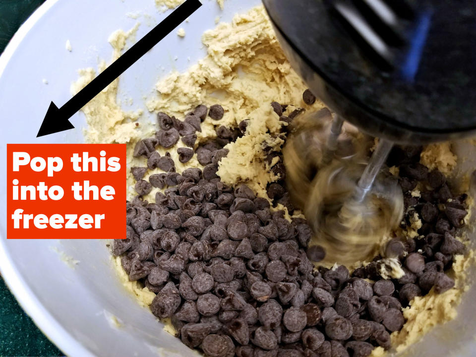 Mixing chocolate chip cookies.