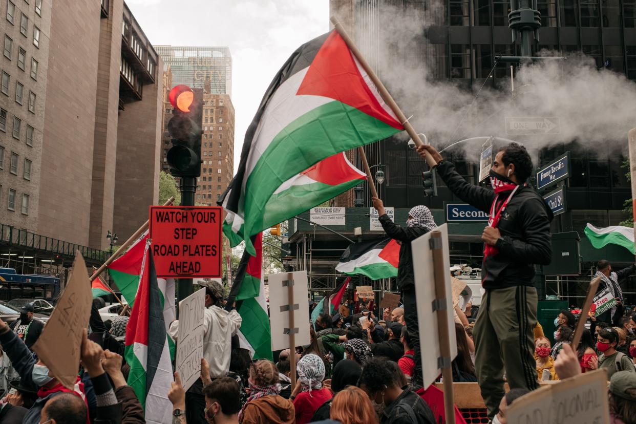 Protesters demanding an end to Israeli aggression against Palestine rally in Midtown Manhattan on May 11, 2021, in New York City.