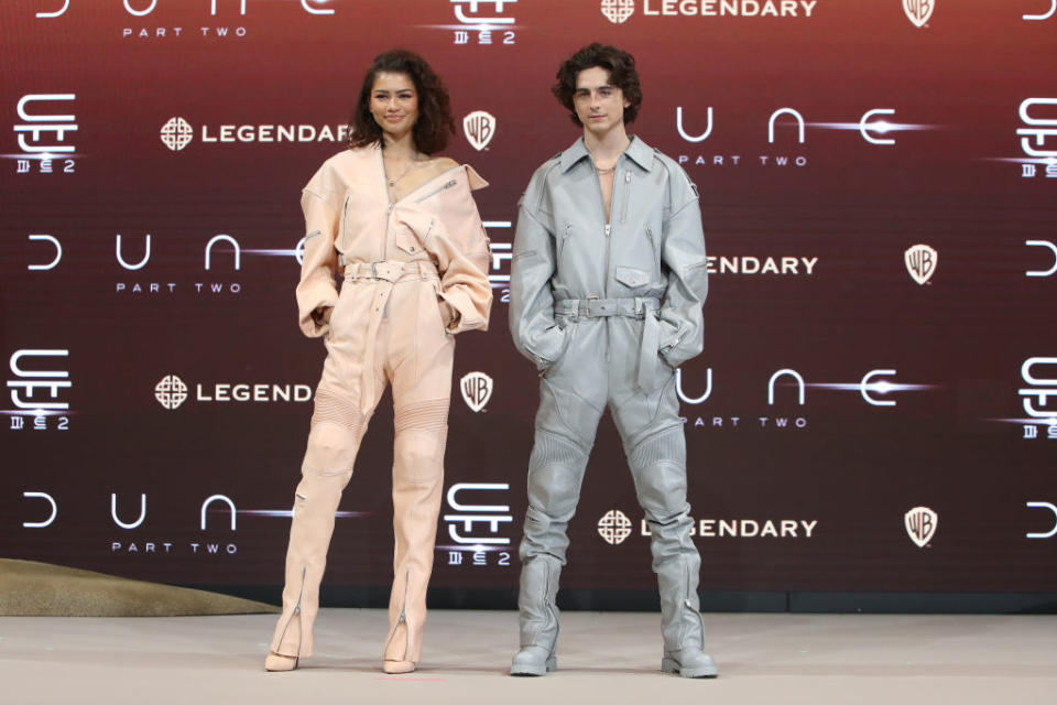 Zendaya and Timothée Chalamet in jumpsuits at a "Dune: Part Two" premiere