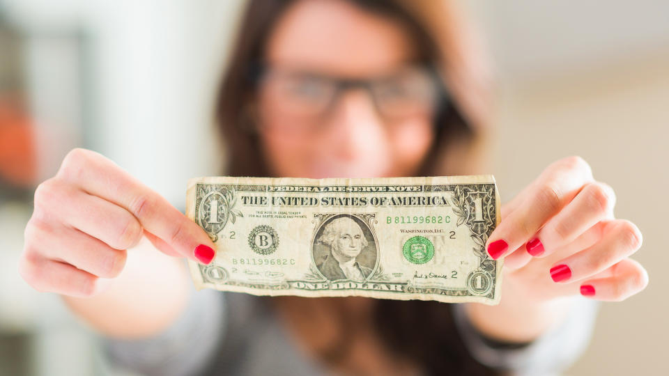 Happy Woman Holding American Dollar Currency, Indoors.