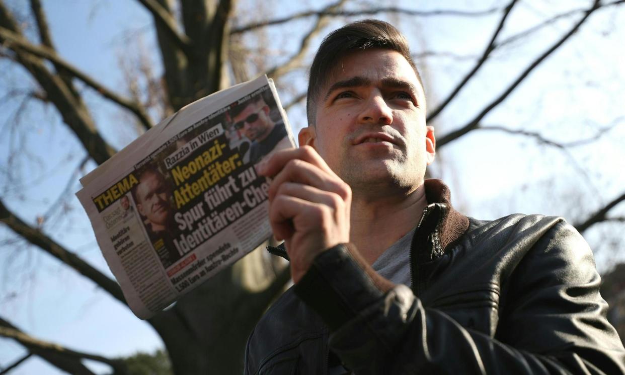 <span>Martin Sellner, Austrian leader of the Identitarian Movement, addresse an anti-migrant meeting attended by neo-Nazis and members of the AfD.</span><span>Photograph: Georg Hochmuth/AFP/Getty Images</span>