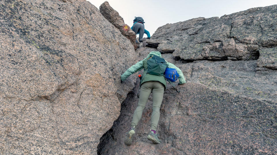 Climbing up through the crux at the top of the Trough, Keyhole route on Longs Peak
