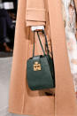 <p>A green gold-clasp bag from the Oscar de la Renta FW18 show. (Photo: Getty Images) </p>