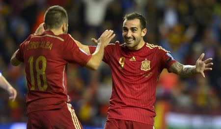 Spain's Jordi Alba (L) and Paco Alcacer celebrate a goal during their Euro 2016 Group C qualification soccer match against Luxembourg in Logrono, Spain October 9, 2015. REUTERS/Vincent West