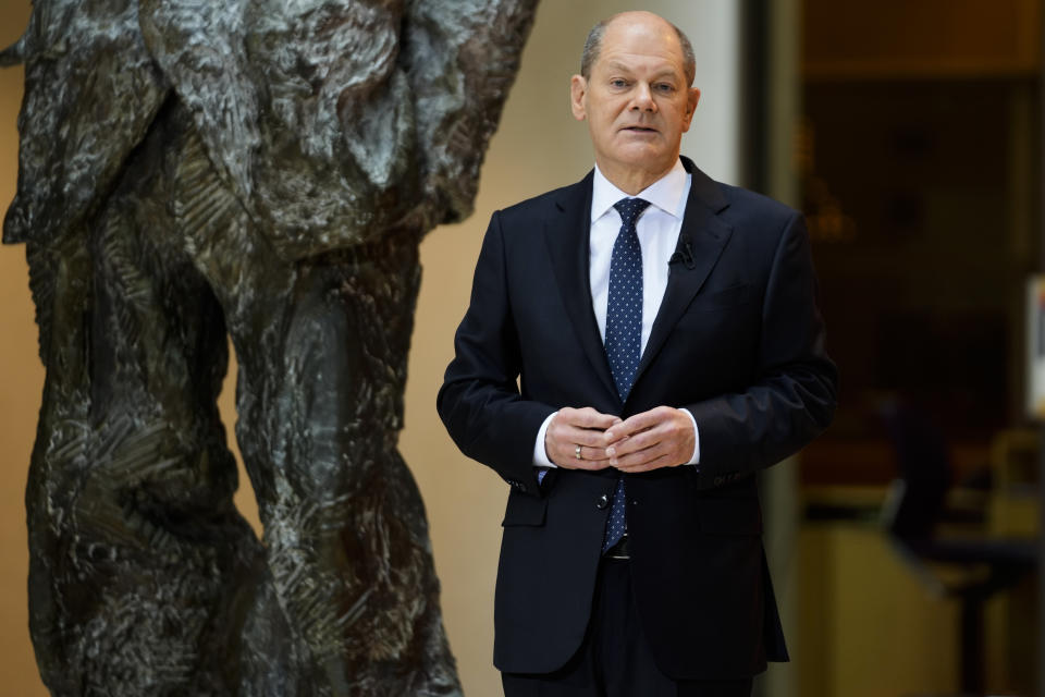 Designated new German chancellor Olaf Scholz presents the ministers of his Social Democratic Party, SPD, for the new German government during a news conference at the party's headquarters in Berlin, Germany, Monday, Dec. 6, 2021. German parliament Bundestag is planning to elect Scholz as new chancellor on Wednesday Dec. 8, 2021. (AP Photo/Markus Schreiber)