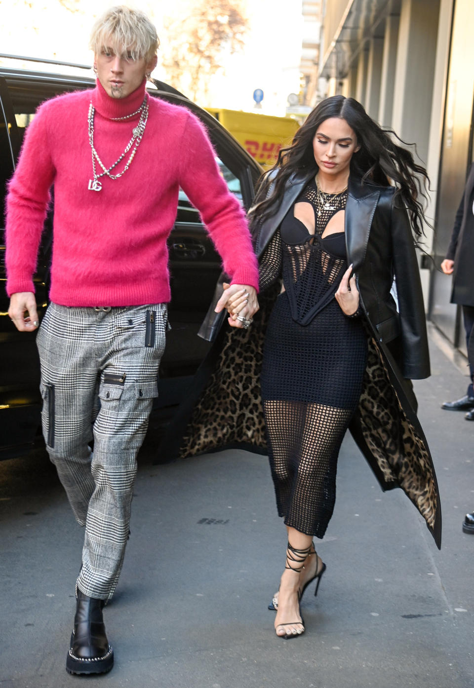 <p>Newly engaged Machine Gun Kelly and Megan Fox arrive at the Dolce & Gabbana showroom in Milan, Italy, on Jan. 14. </p>
