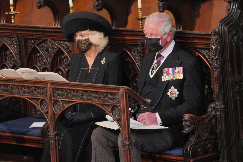 <p>Prince Charles and Camilla, Duchess of Cornwall, inside St George’s Chapel. </p>