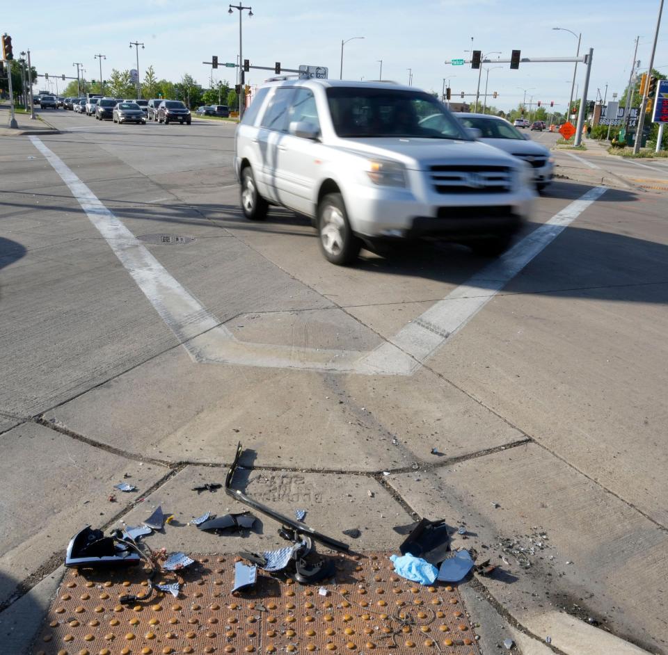 Debris remains on the street after a vehicle accident left four people dead near the corner of North 60th street and West Fond Du Lac Avenue in Milwaukee on Monday, May 15, 2023.
