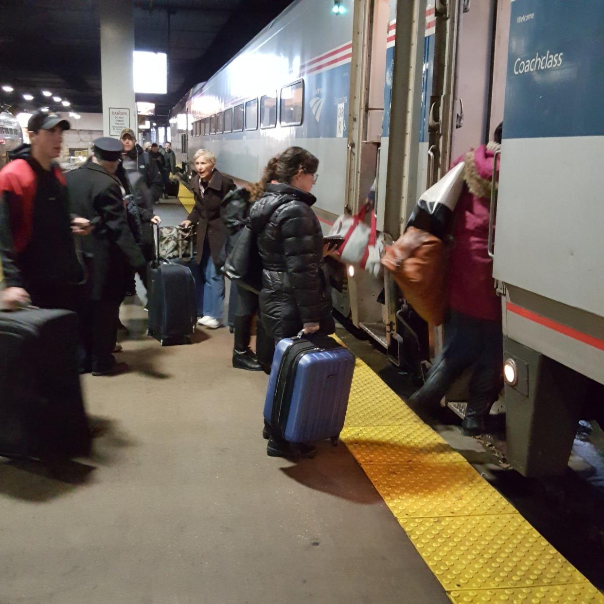 Customers are boarding a train at Chicago Union Station. A new line, starting May 21, 2024, will connect the Twin Cities to Chicago and Milwaukee.