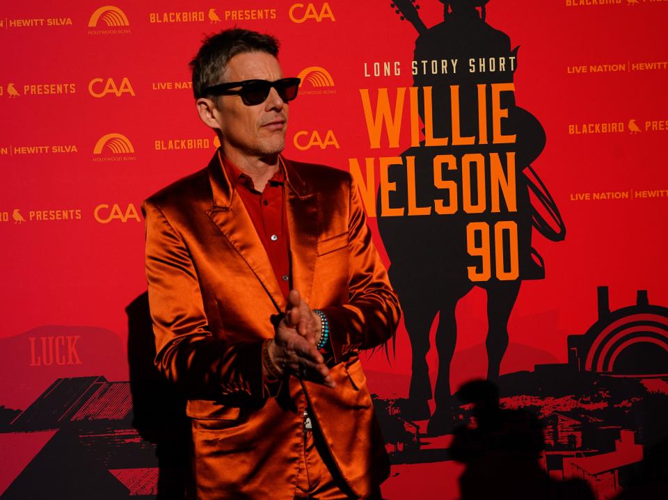 Actor Ethan Hawke arrives at Willie Nelson's 90th birthday party in L.A. Hawke, a native Austinite, will induct John Prine into the "ACL" Hall of Fame.