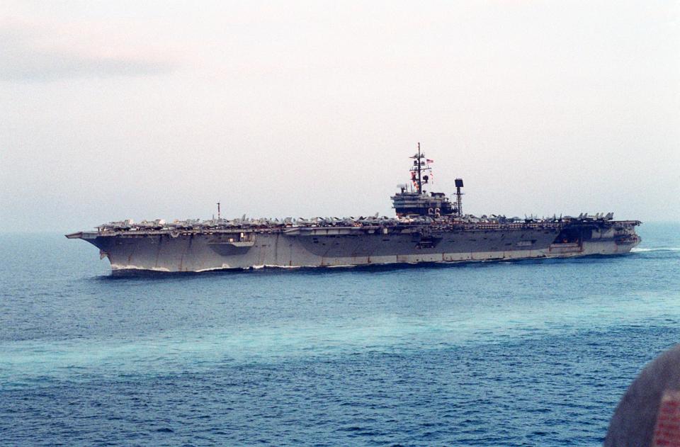 Aircraft crowd the flight deck of USS America (CV-66) 