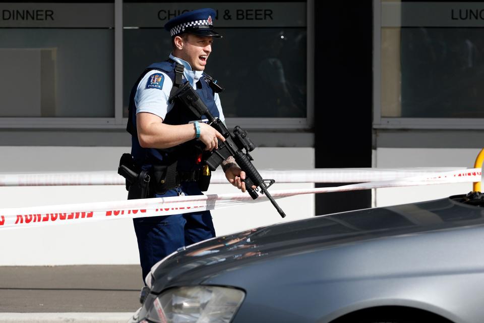 A police officer shouts as he secures the premises near the mosque in Christchurch after the attacks last month. Source: Getty Images