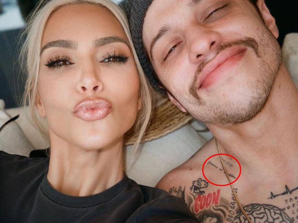 Davidson has at least four tattoos dedicated to Kardashian, including his latest collarbone ink in honour of their SNL kiss (Kim Kardashian/Instagram)