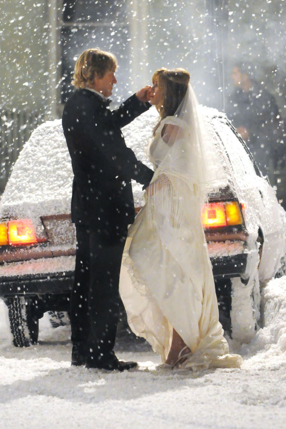 <p>Jenny's (Jennifer Aniston) winter wedding dress looked magical in a snowstorm, even though we imagine she was quite cold. The <em>Marley and Me </em>wedding took place at the very beginning of the movie, pre-Marley.<br></p>