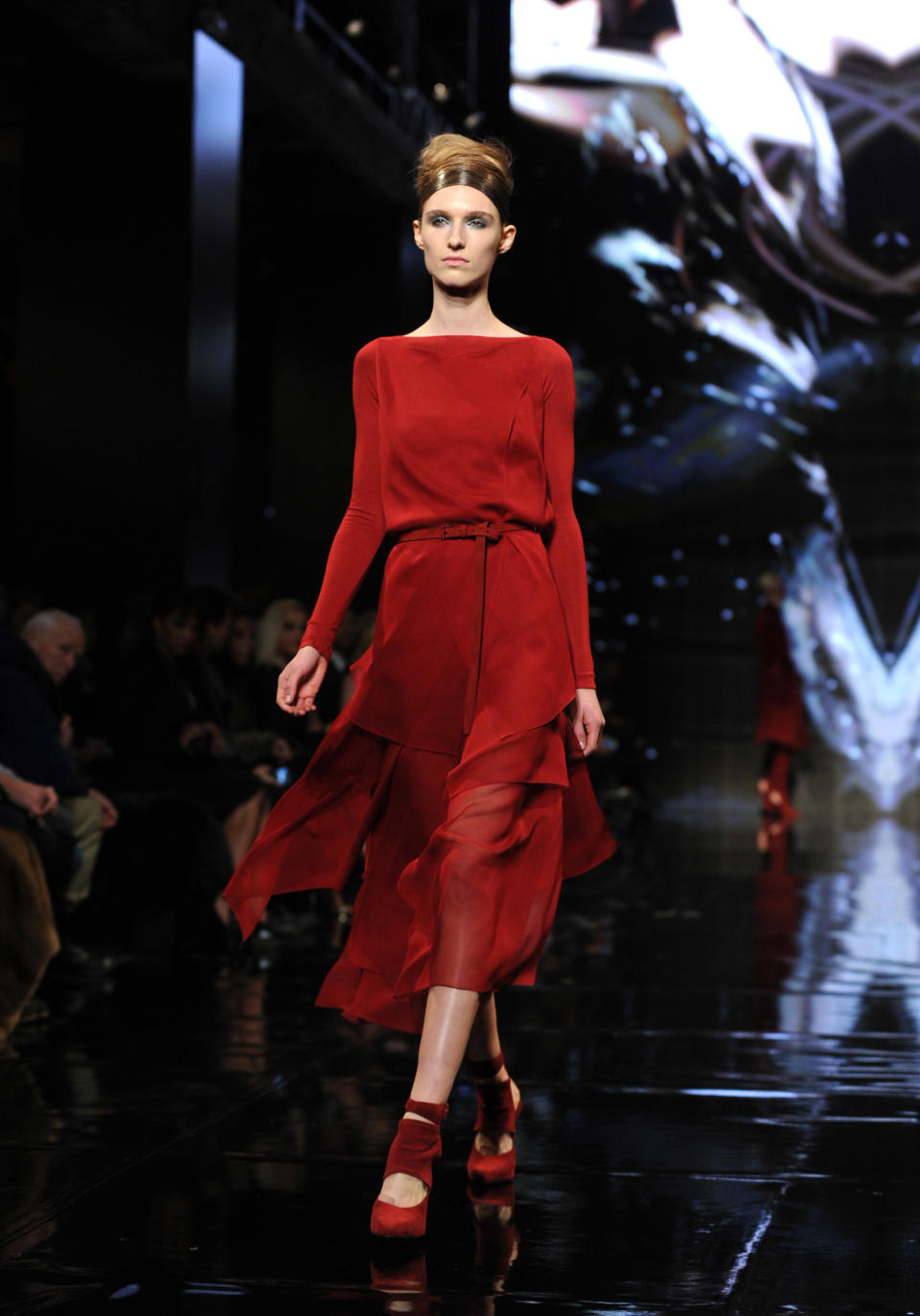 The Donna Karan New York Fall 2014 collection is modeled during Fashion Week, Monday, Feb. 10, 2014, at 23 Wall Street in New York. (AP Photo/Diane Bondareff)