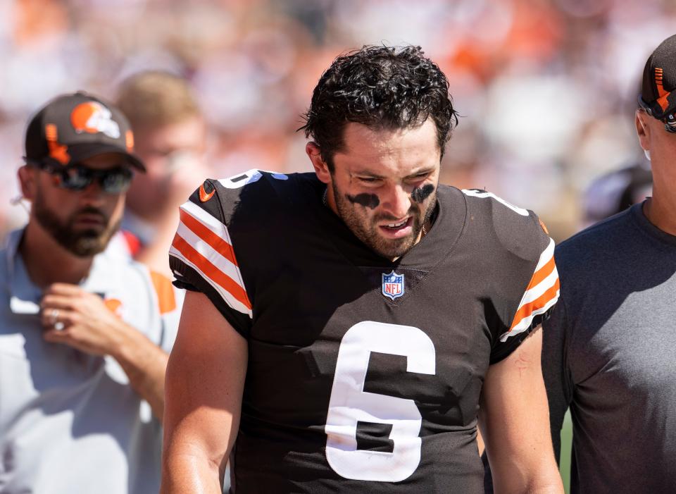 Sep 19, 2021; Cleveland, Ohio, USA; Cleveland Browns quarterback Baker Mayfield (6) walks to the medical tent following an injury during the second quarter against the Houston Texans at FirstEnergy Stadium. Mandatory Credit: Scott Galvin-USA TODAY Sports