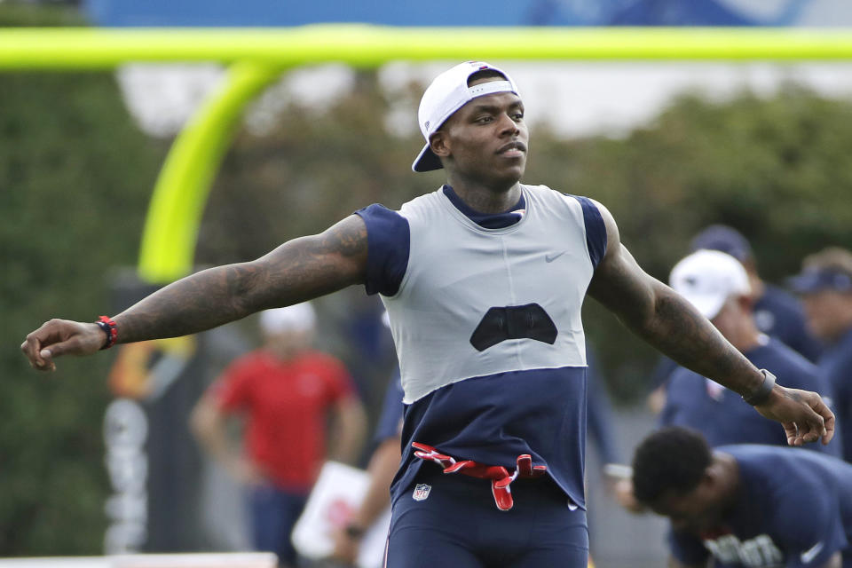 New England Patriots wide receiver Josh Gordon warms up at an NFL football practice, Monday, Aug. 19, 2019, in Foxborough, Mass. (AP Photo/Elise Amendola)