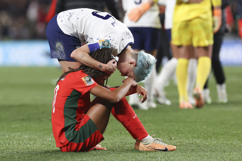 United States' Megan Rapinoe consoles Portugal's Jessica Silva