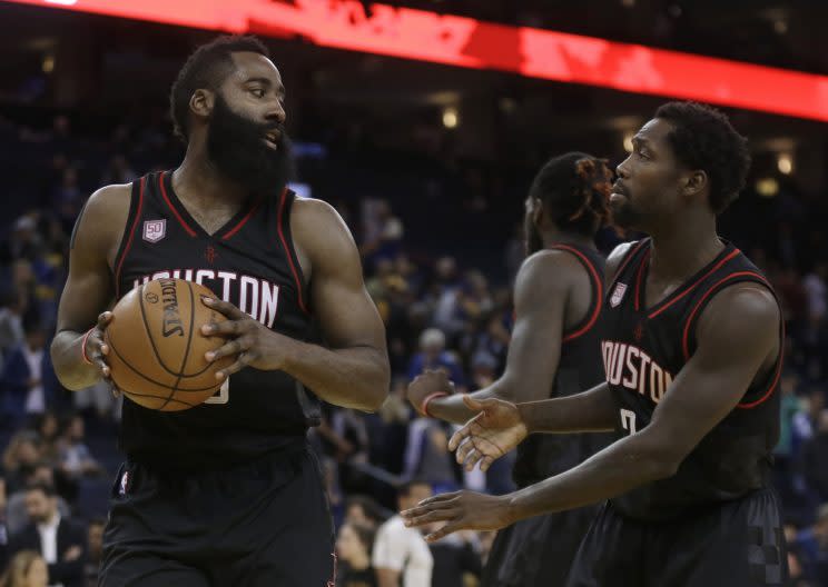 The Rockets played tough for two overtimes to end the Warriors' 12-game winning streak. (Associated Press)