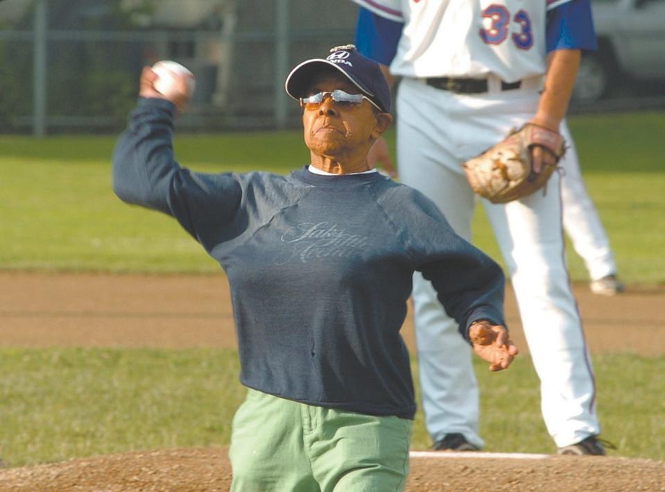 Katey Grovell of Newport throws out a first pitch at a Newport Gulls game in 2012.