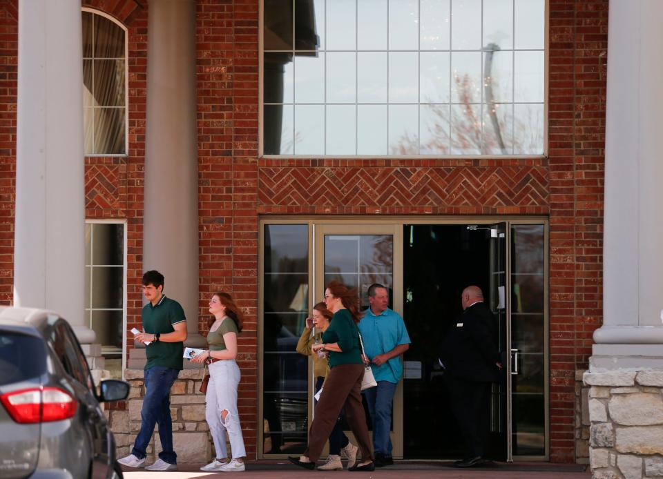 Mourners leave Greenlawn Funeral Home in Springfield, Mo. after a visitation and celebration of life was held for Riley Strain, 22, on Friday, March 29, 2024. Strain's body was found in the Cumberland River after a 2-week search.