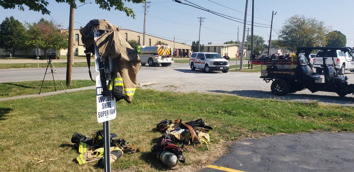 Emergency responders set up a staging area near Teutopolis High School on Saturday, Sept. 30, 2023, in Teutopolis, Illinois (AP)