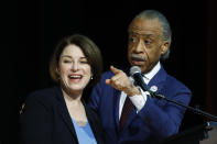 Democratic presidential candidate Sen. Amy Klobuchar, D-Minn., stands with Rev. Al Sharpton after speaking at the National Action Network South Carolina Ministers' Breakfast, Wednesday, Feb. 26, 2020, in North Charleston, S.C. (AP Photo/Matt Rourke)