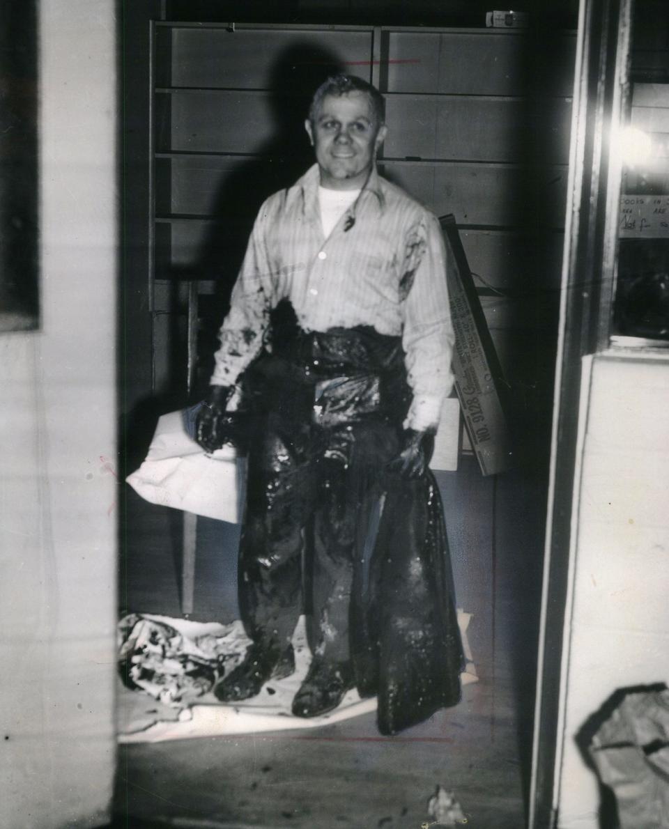 R. Wiley Brownlee, principal of Willow Run High School, manages a smile as he returned to Willow Run High after being tarred and feathered by the Klu Klux Klan.