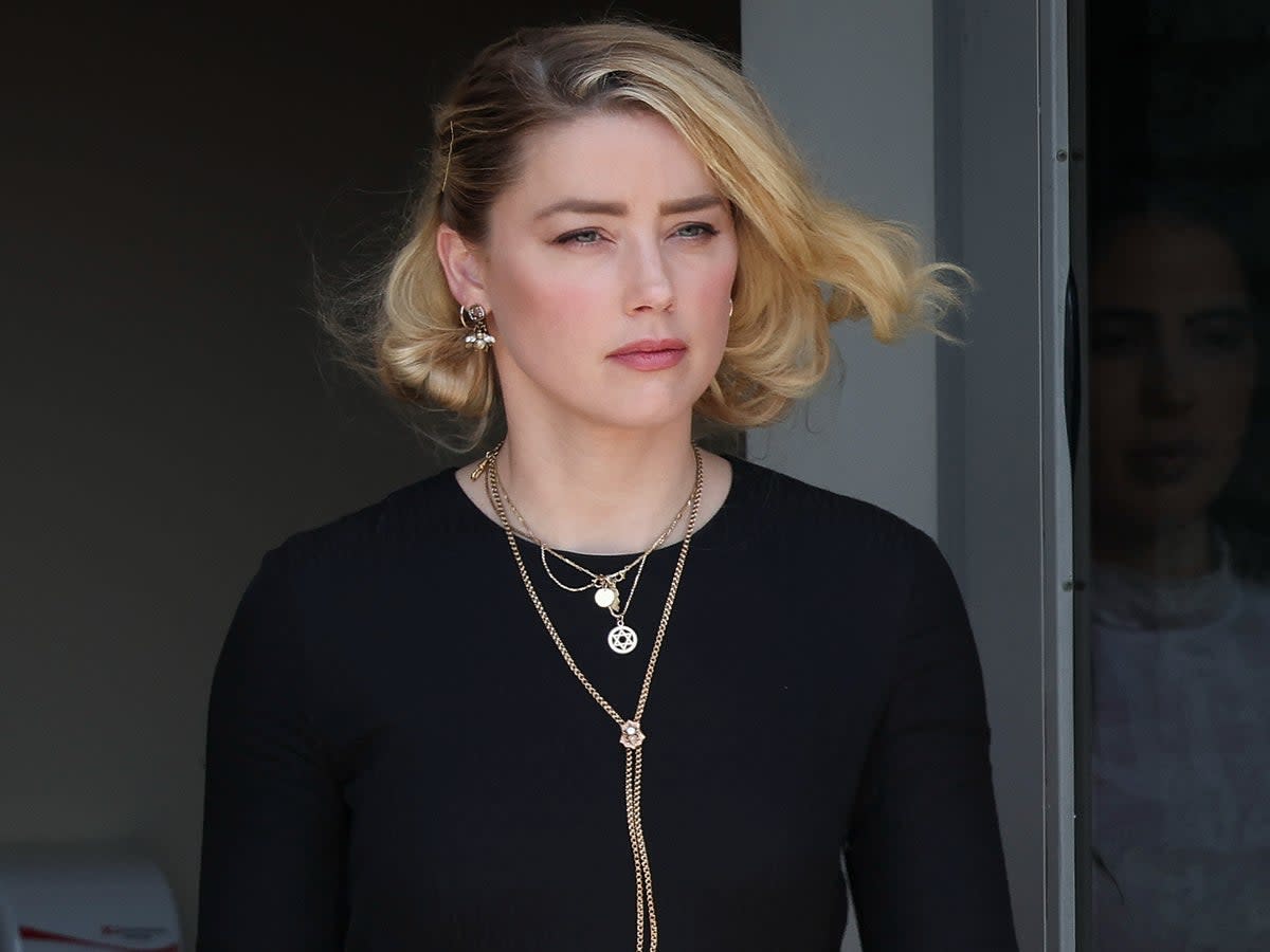 Amber Heard departs the Fairfax County Courthouse on 1 June 2022 in Fairfax, Virginia (Win McNamee/Getty Images)