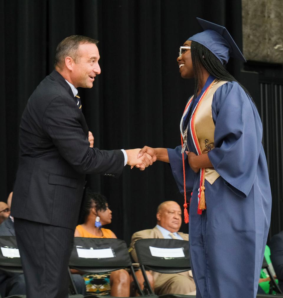 Paul Bryant High School presented 227 seniors for graduation Tuesday, May 17, 2023, at Tuscaloosa Amphitheater. Superintendent Mike Daria shakes hands with graduates as they cross the stage. 