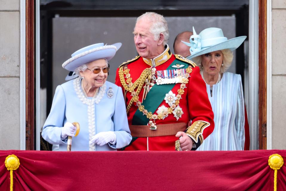 (L-R)  Prince Charles, Prince of Wales, Queen Elizabeth II and Camilla, Duchess of Cornwall on the balcony of Buckingham Palace during the Trooping the Colour parade on June 2, 2022 in London.